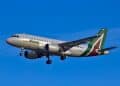 white and green plane during daytime